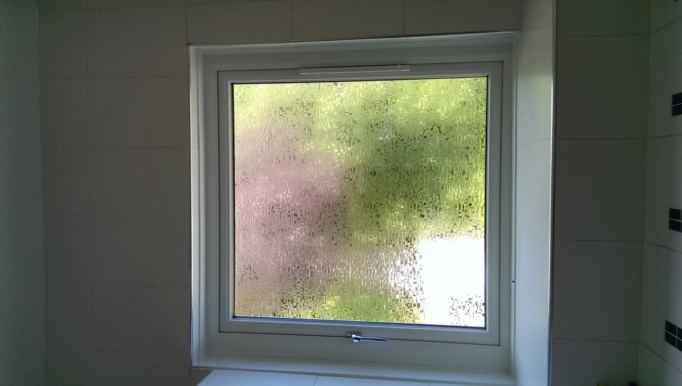 White uPVC bathroom window with obscure privacy glass