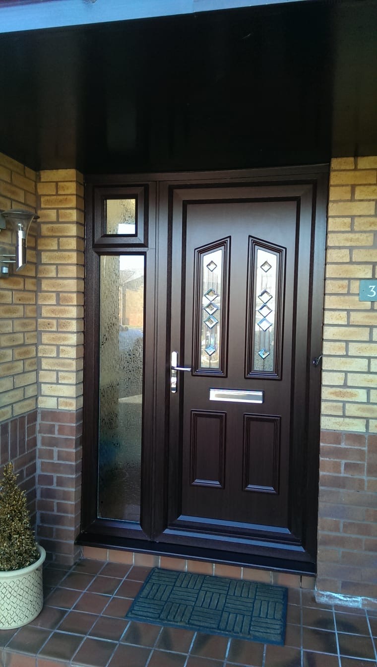 Dark brown composite front door with diamond decorative glass and side panel